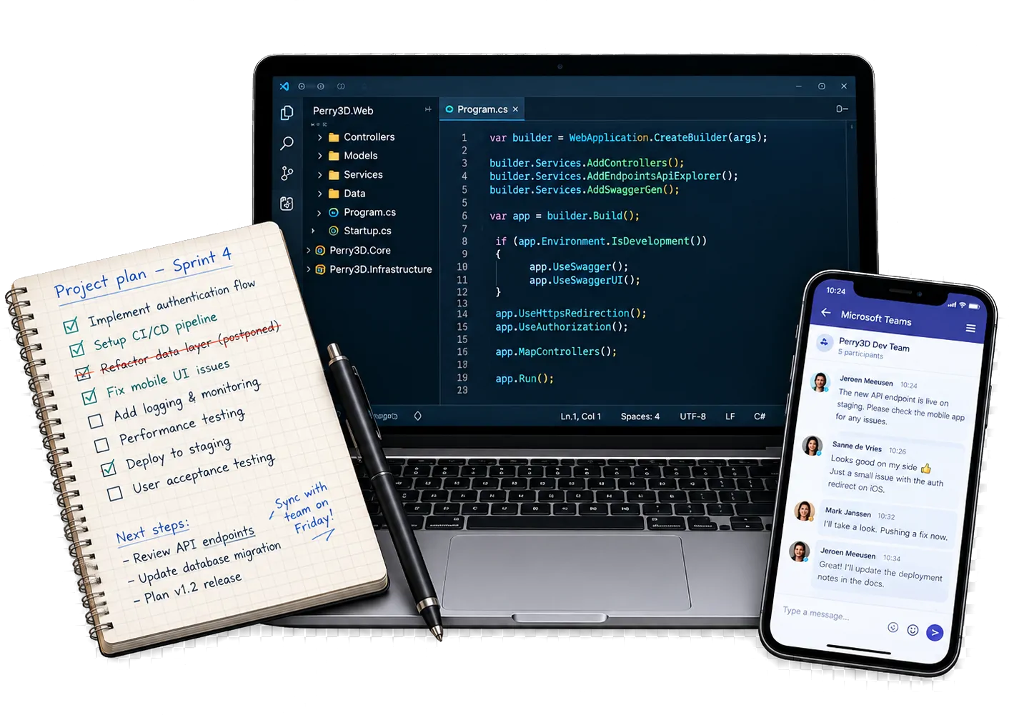 A laptop showing C# in an editor, beside a notebook of sprint tasks and a phone showing the team chat.